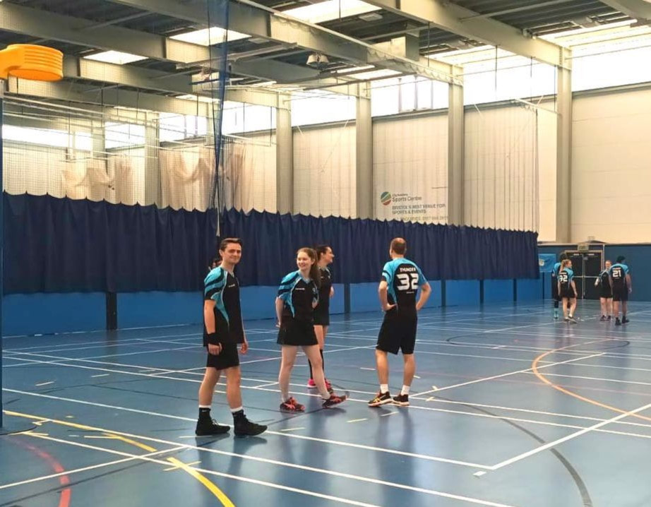 A division of korfballers standing ready to play a match